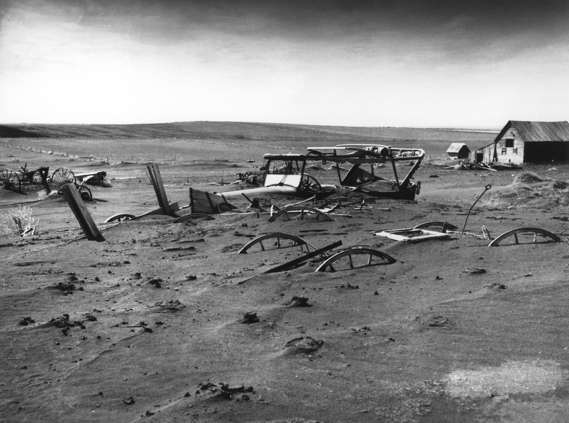 Buried machinery in a barn lot, Dallas, South Dakota 
